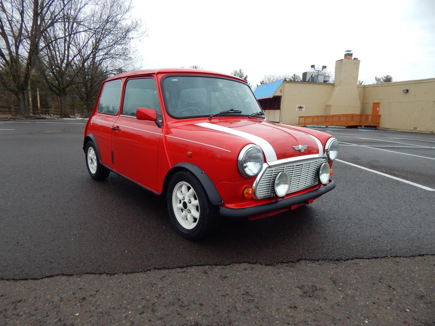 1981 RED /Black Cloth Austin Mini Cooper (AA25AU11248) with an 1275 CC engine, 4 speed manual transmission, located at 6528 Lower York Road, New Hope, PA, 18938, (215) 862-9555, 40.358707, -74.977882 - Very cool, great driving 1981 Austin Mini-Cooper. We believe it is a 1981 due to the rear taillights. The title shows it as a 1969 model year, however the cars built in the 1960s had outside door hinges. Also , the windows were sliding instead of the roll up windows this vehicle has.. Red/ whit - Photo#10